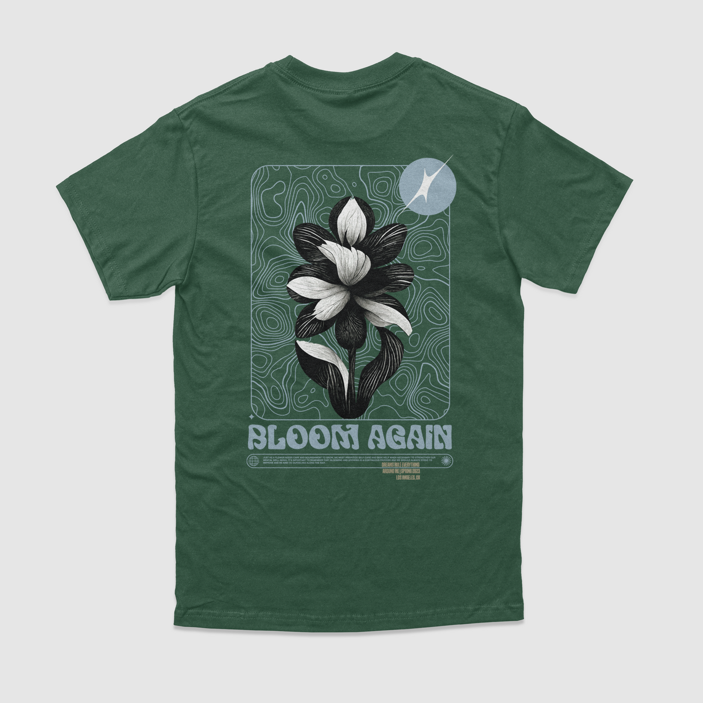 "Bloom Again" TeeJust as a flower needs care and nourishment to grow, we must prioritize self-care and seek help when necessary to strengthen our mental well-being. It's important toDREAM Clothing 