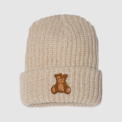 Handle With Care Chunky Knit Beanie (Oatmeal)Our Handle with Care Beanies feature Patches the Dream Teddy Bear. Patches is a reminder that we're capable of overcoming anything that comes our way. It's a gentle DREAM Clothing 